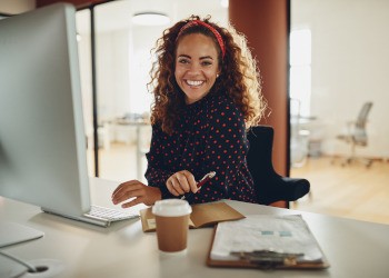 Woman smiling at an office